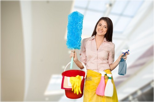 Cleaning staff following safety procedures in a property