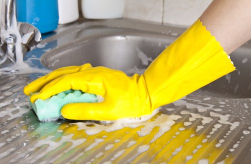 Kitchen and cupboard cleaning during a move in clean in Brompton